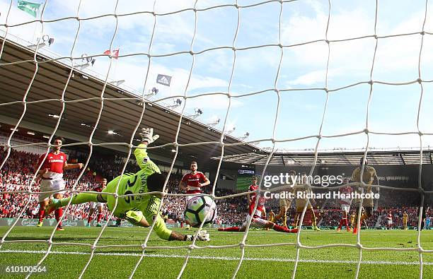 Heung-Min Son of Tottenham Hotspur scores his sides first goal during the Premier League match between Middlesbrough and Tottenham Hotspur at the...