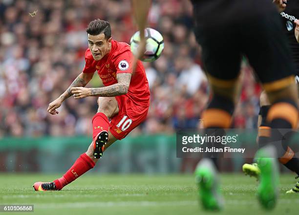 Philippe Coutinho of Liverpool scores their fourth goal during the Premier League match between Liverpool and Hull City at Anfield on September 24,...