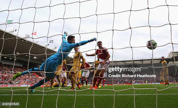 Ben Gibson of Middlesbrough scores his sides first goal during the Premier League match between Middlesbrough and Tottenham Hotspur at the Riverside...