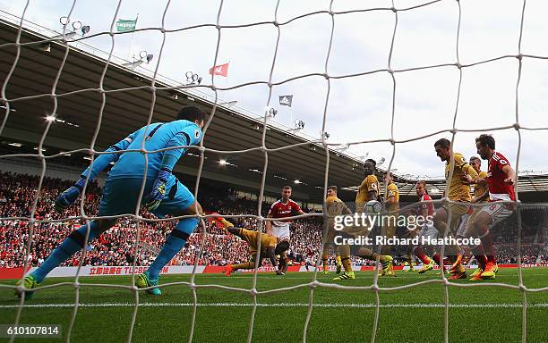 Ben Gibson of Middlesbrough scores his sides first goal during the Premier League match between Middlesbrough and Tottenham Hotspur at the Riverside...