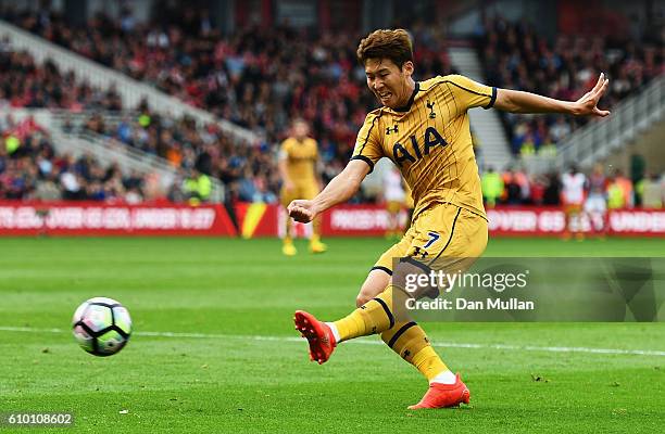 Heung-Min Son of Tottenham Hotspur shoots during the Premier League match between Middlesbrough and Tottenham Hotspur at the Riverside Stadium on...