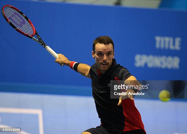 Roberto Bautista of Spain in action against Stan Wawrinka of Switzerland during the semifinal of Men's singles of Saint-Petersburg Open 2016...