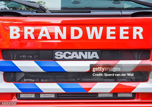fire engine front with the dutch name brandweer - extinguishing bildbanksfoton och bilder