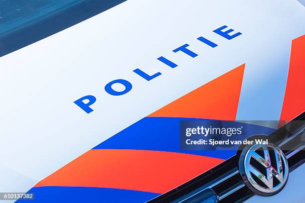 police - politie in dutch on a police car front - police siren stock pictures, royalty-free photos & images