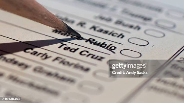 an angery voter crosses  rubio off primary ballot - chelsea michigan stock pictures, royalty-free photos & images