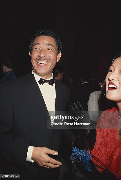 Japanese designer Issey Miyake attends the Miyake Restrospective held at the Ace Gallery in Soho, New York, 1994.