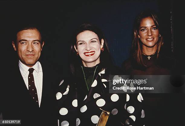 French fashion designer Paloma Picasso with husband Rafael Lopez Sanchez and Kelly Klein at a Pools launch party, circa 1990.