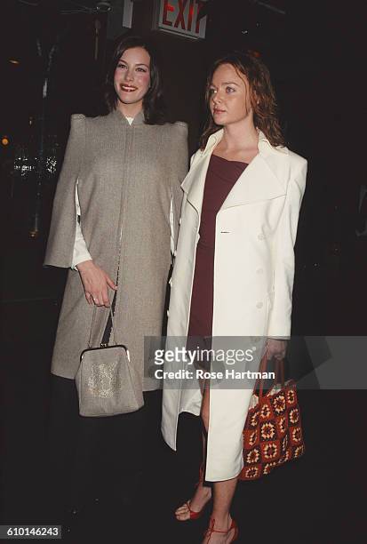American actress Liv Tyler and British fashion designer Stella McCartney at the Ovarian Cancer Research Fund Millennium Dresses benefit and auction,...