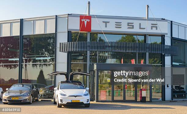tesla model x p90d and model s all-electric crossover cars - s 2016 show stock pictures, royalty-free photos & images