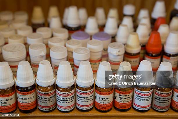 Homeopathy and natural therapies - when all else falls, the alternative practitioner is the last hope for many people. The photo shows bottles with...