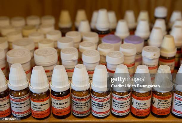 Homeopathy and natural therapies - when all else falls, the alternative practitioner is the last hope for many people. The photo shows bottles with...