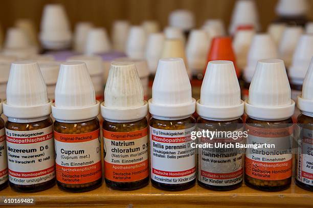 Homeopathy and natural therapies - when all else falls, the alternative practitioner is the last hope for many people. The photo shows bottles with...