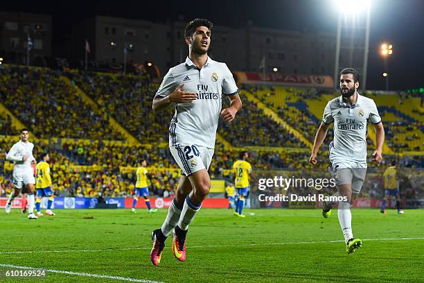 Marco Asensio of Real Madrid CF celebrates after scoring his team's first goal during the La Liga match between UD Las Palmas and Real Madrid CF on...