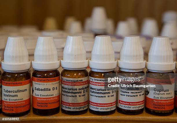 Homeopathy and natural therapies - when all else falls, the alternative practitioner is the last hope for many people. The photo shows bottles with...