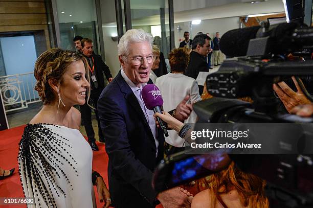 Alejandra Silva and Richard Gere attend the red carpet of the closing gala of 64th San Sebastian Film Festival at Kursaal on September 24, 2016 in...