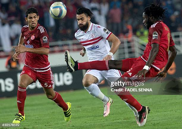 Zamalek Sporting Club's Hazem Mohammed Abdehamid Emam vies with Wydad Athletic Club's Amine Atouchi during the CAF Champions League semi-final...