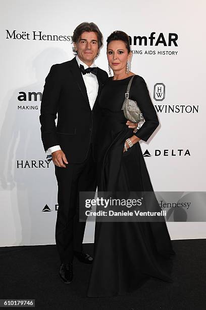 Dimitri D'Asburgo and Daniela Santanchè walk the red carpet of amfAR Milano 2016 at La Permanente on September 24, 2016 in Milan, Italy.