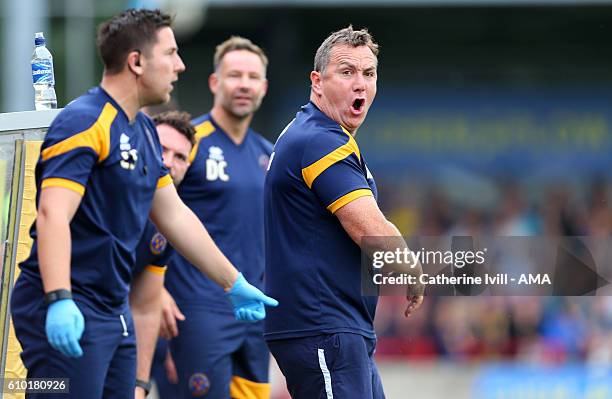 Micky Mellon manager of Shrewsbury Town reacts during the Sky Bet League One match between AFC Wimbledon and Shrewsbury Town at The Cherry Red...