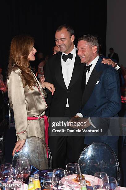 Carolina Parsons, Milutin Gatsby and Lapo Elkann are seen at the dinner of amfAR Milano 2016 at La Permanente on September 24, 2016 in Milan, Italy.