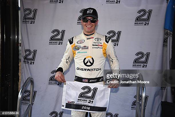 Erik Jones, driver of the GameStop Toyota, poses with the pole award after qualifying for the NACAR XFINITY Series VisitMyrtleBeach.com 300 at...