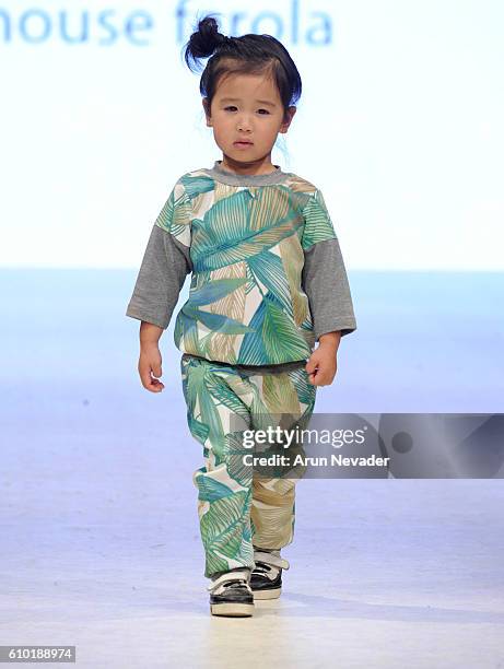 Model walks the runway wearing House of Farola at Vancouver Fashion Week on September 24, 2016 in Vancouver, Canada.