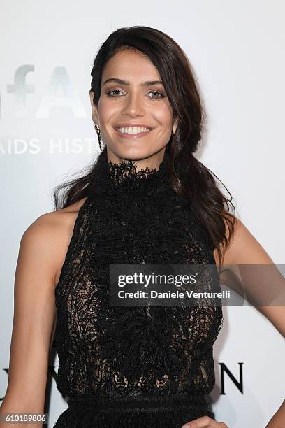 Amanda Wellsh walks the red carpet of amfAR Milano 2016 at La Permanente on September 24, 2016 in Milan, Italy.