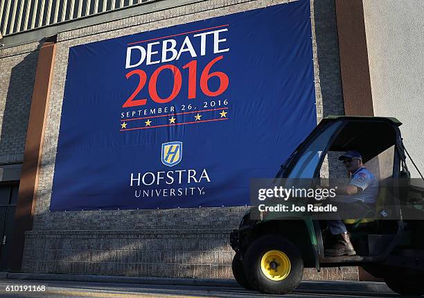 Debate sign hangs on a wall outside the media center setup for the first U.S. Presidential debate at Hofstra University on September 24, 2016 in...