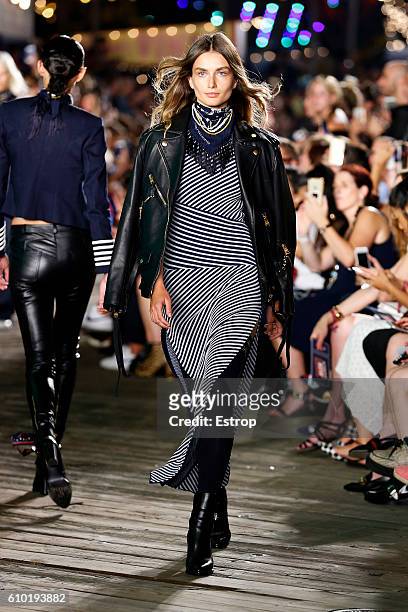 Model walks the runway at the Tommy Hilfiger Women's show at Pier 19 on September 9, 2016 in New York City.
