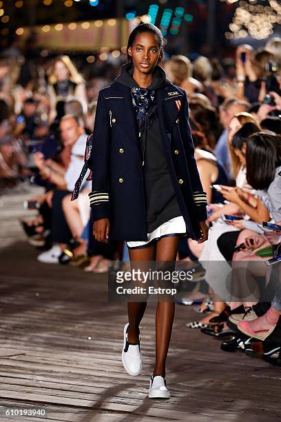 Model walks the runway at the Tommy Hilfiger Women's show at Pier 19 on September 9, 2016 in New York City.