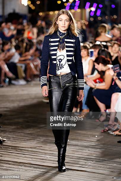 Model Gigi Hadid walks the runway at the Tommy Hilfiger Women's show at Pier 19 on September 9, 2016 in New York City.