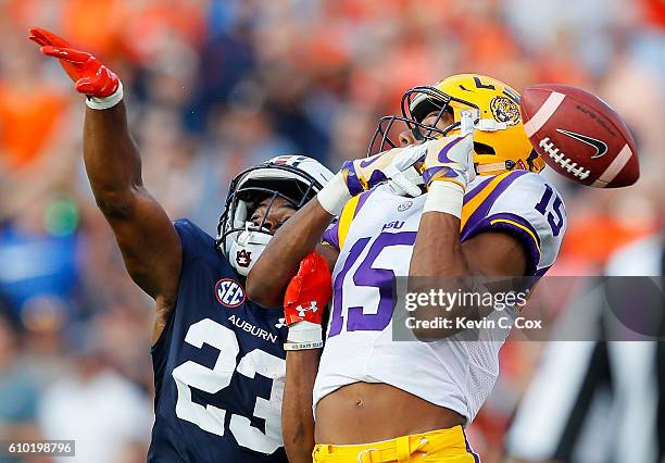 Malachi Dupre of the LSU Tigers fails to pull in this reception against Johnathan Ford of the Auburn Tigers at Jordan-Hare Stadium on September 24,...