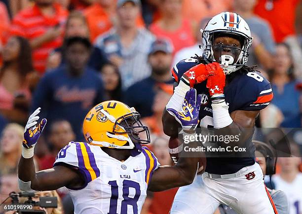 Tony Stevens of the Auburn Tigers fails to pull in this touchdown reception against Tre'Davious White of the LSU Tigers at Jordan-Hare Stadium on...