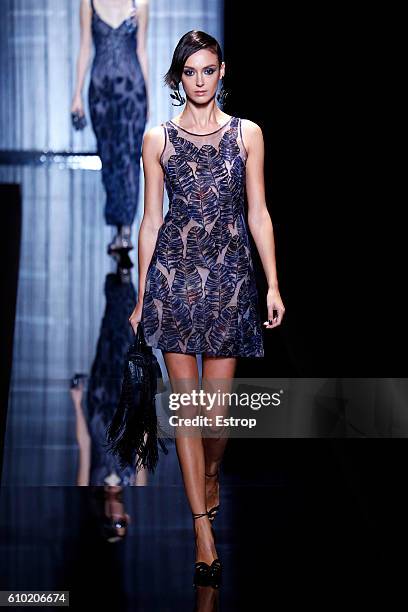 Model walks the runway at the Giorgio Armani show Milan Fashion Week Spring/Summer 2017 on September 23, 2016 in Milan, Italy.