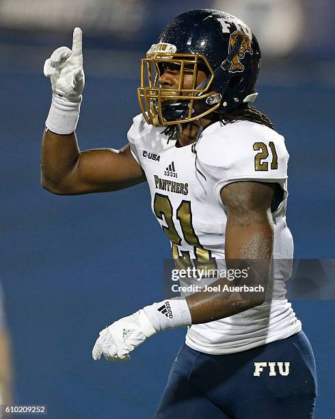 Stantley Thomas of the Florida International Golden Panthers celebrates after scoring a fourth quarter touchdown against the Central Florida Knights...