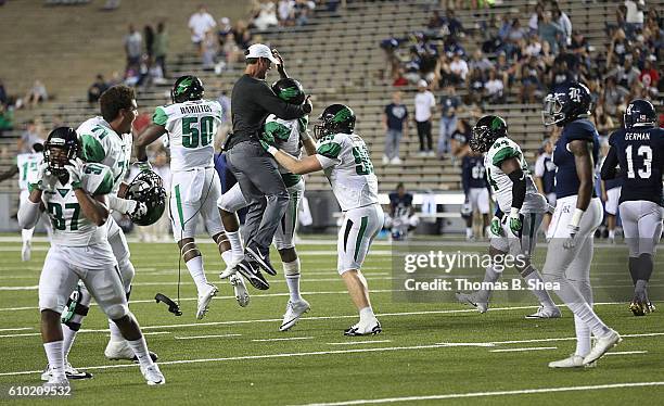 The North Texas Mean Green celebrate defeating the Rice Owls in double overtime at Rice Stadium on September 24, 2016 in Houston, Texas. North Texas...