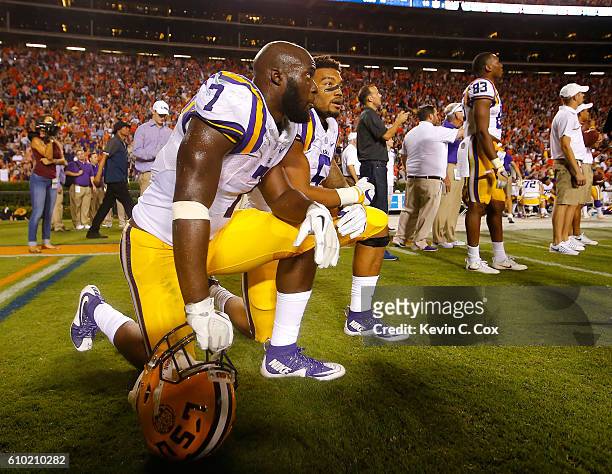 Leonard Fournette and Derrius Guice of the LSU Tigers look on as the review the last play of the game against the Auburn Tigers at Jordan-Hare...