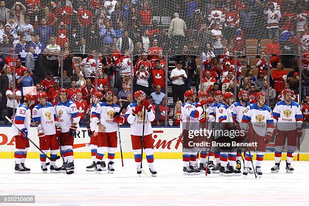 Team Russia reacts after their loss to Team Canada at the semifinal game during the World Cup of Hockey tournament at Air Canada Centre on September...