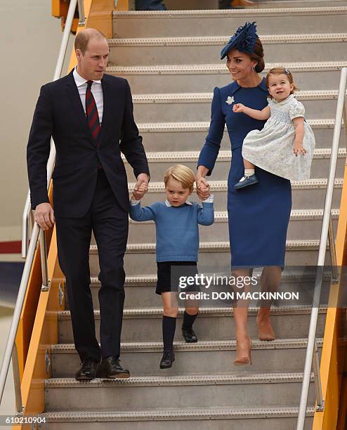 Prince William, Duke of Cambridge, Prince George of Cambridge, Catherine, Duchess of Cambridge and Princess Charlotte of Cambridge arrive at 443...