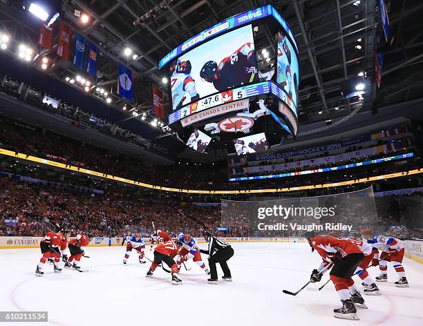 Patrice Bergeron of Team Canada faces-off against Artem Anisimov of Team Russia at the semifinal game during the World Cup of Hockey 2016 tournament...