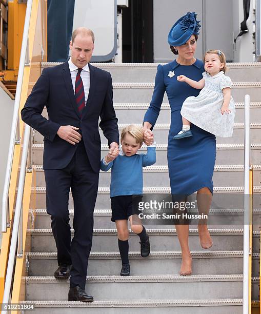 Prince William, Duke of Cambridge, Catherine, Duchess of Cambridge, Prince George of Cambridge and Princess Charlotte of Cambridge arrive at Victoria...