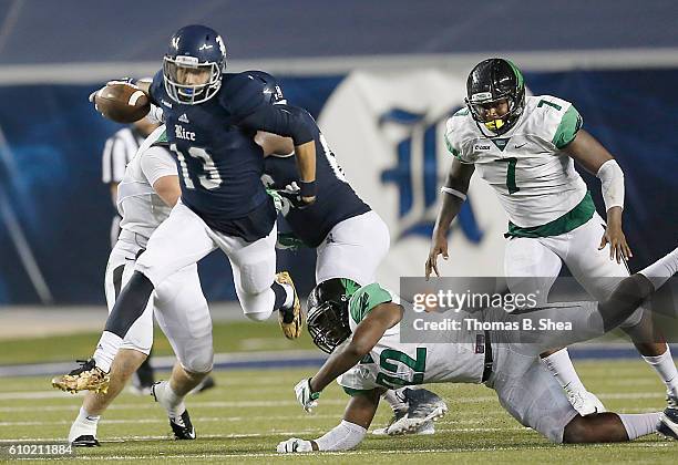 Quarterback Nate German of the Rice Owls rushes agains the North Texas Mean Green in the second half at Rice Stadium on September 24, 2016 in...