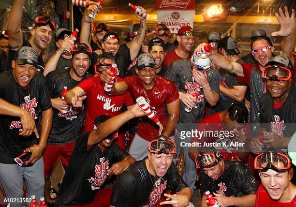 The Washington Nationals celebrate after clinching the National League East Division Championship after defeating the Pittsburgh Pirates 6-1 at PNC...
