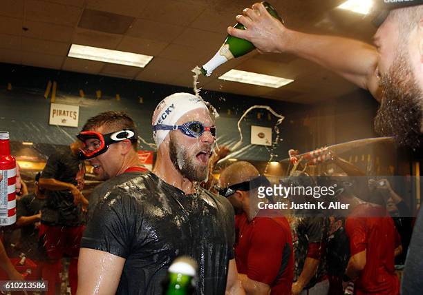 Bryce Harper of the Washington Nationals celebrates after clinching the National League East Division Championship after defeating the Pittsburgh...