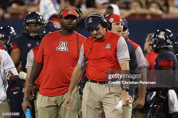 Head coach Rich Rodriguez of the Arizona Wildcats reacts on the sidelines during the college football game against the Washington Huskies at Arizona...