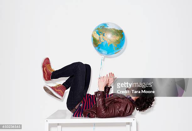 man playing with world balloon - world war 2 stock-fotos und bilder