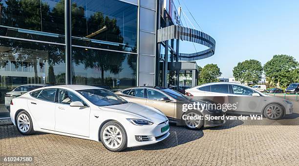 tesla model s all-electric and model x p90d crossover cars - tesla model s stock pictures, royalty-free photos & images