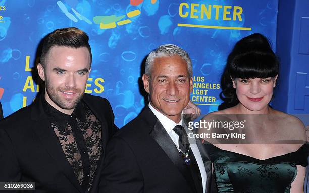 Singer Brian Justin Crum, actress Pauley Perrette and Olympic Diver Greg Louganis attend Los Angeles LGBT Center's 47th Anniversary Gala at Pacific...