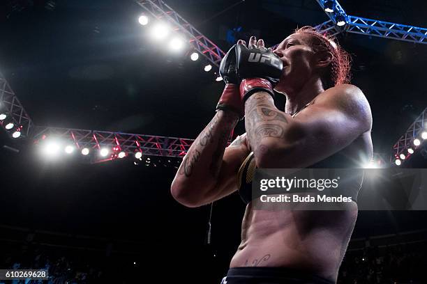 Cris Cyborg of Brazil celebrates victory over Lina Lansberg of Sweden in their catchweight UFC bout during the UFC Fight Night event at Nilson Nelson...