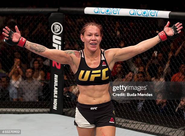 Cris Cyborg of Brazil celebrates victory over Lina Lansberg of Sweden in their catchweight UFC bout during the UFC Fight Night event at Nilson Nelson...