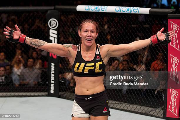 Cris Cyborg of Brazil celebrates victory over Lina Lansberg of Sweden in their catchweight UFC bout during the UFC Fight Night event at Nilson Nelson...